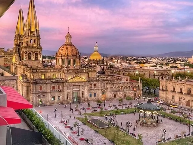 Scenic view of Guadalajara Cathedral and surrounding plaza at sunset